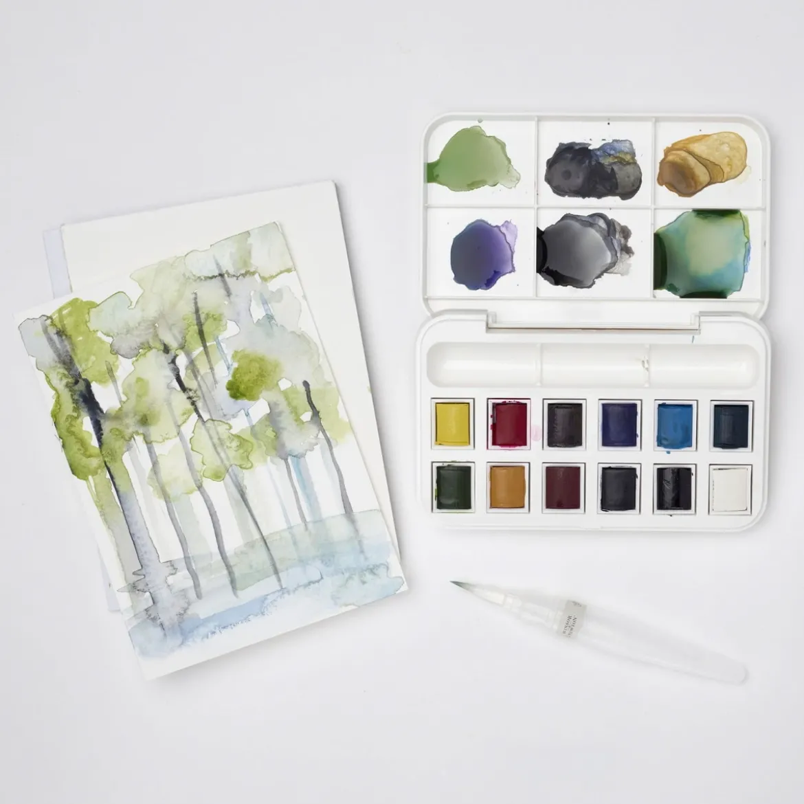 Winsor & Newton Cotman Brush Pocket Set, 12 halvkoppar + vattenpensel